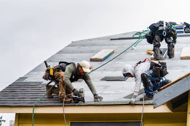 Professional Gutter Installation technician working in Rogers, OH